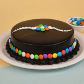 Chocolate Gems Cake for Rakhi - YuvaFlowers