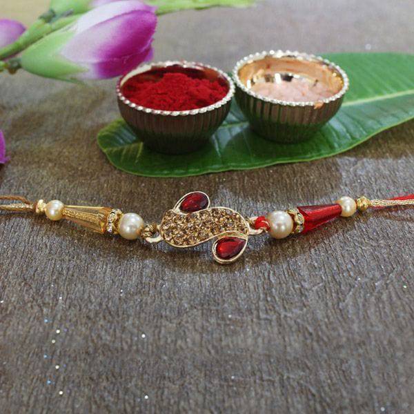 Dazzling Red & Golden Rakhi Online - YuvaFlowers