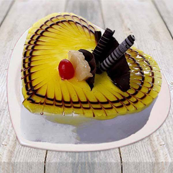 Half kg Lovely Pineapple Heart Shape Cake - YuvaFlowers