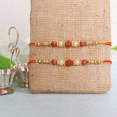 Pearl Rudraksha Rakhis - YuvaFlowers