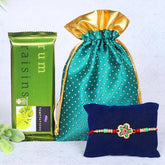 Temptation with Designer Rakhi in Potli - YuvaFlowers