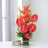 Vase of anthurium and Ferrero Rocher Chocoalte - YuvaFlowers