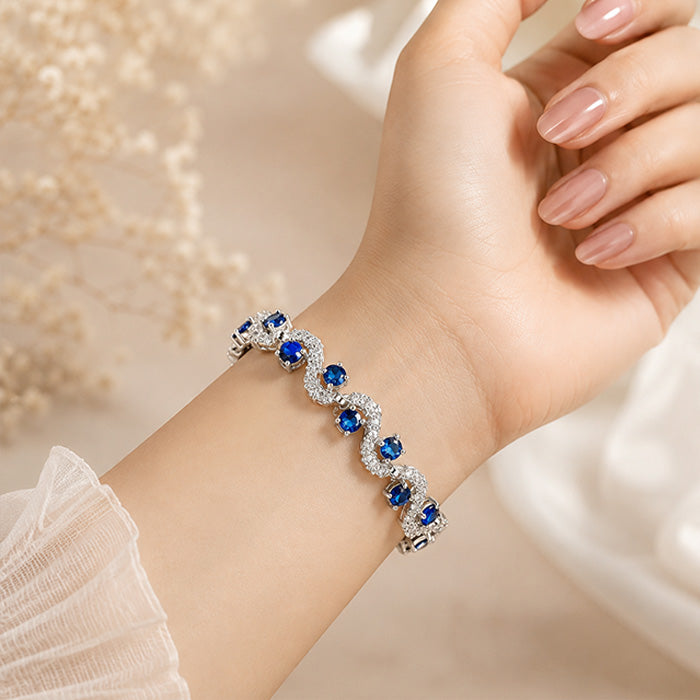 Elegant Blue Sapphire Crystal Wave Bracelet – Silver Plated Luxury Bracelet for Women