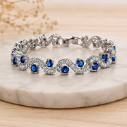 Elegant Blue Sapphire Crystal Wave Bracelet – Silver Plated Luxury Bracelet for Women