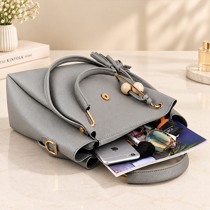 Elegant Grey Women’s Handbag with Gold-Tone Buckle & Tassel Detail
