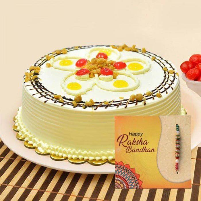 Butterscotch cake with Elegant Rakhi - YuvaFlowers