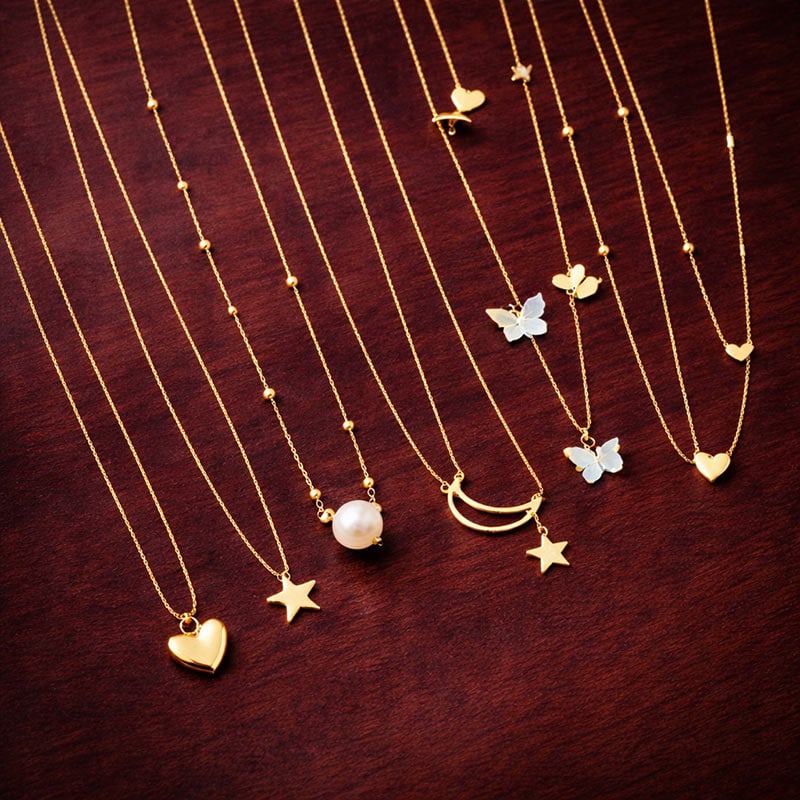 Celestial Charm Gold Necklace Collection – Heart, Star, Butterfly & Pearl Pendants