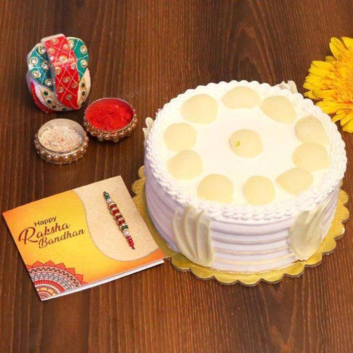 Cheery Rasgulla Cake Rakhi Combo - YuvaFlowers