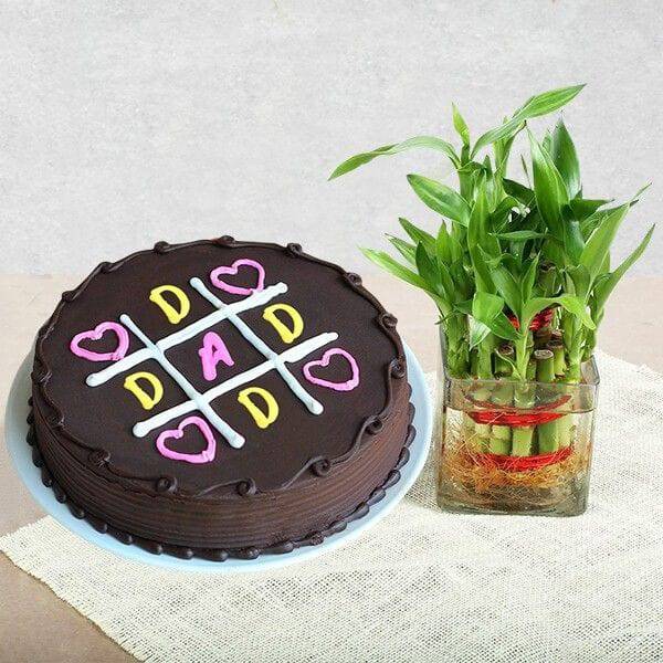 Delicious XOXO Cake with Lucky Bamboo - YuvaFlowers