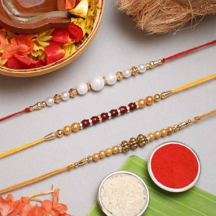 Designer Chawal Roli Pack, Rakhi Set 3 - YuvaFlowers