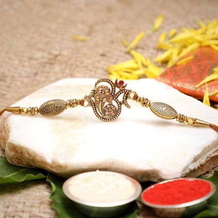 Designer Ganesha  Rakhi With Roli Pack - YuvaFlowers