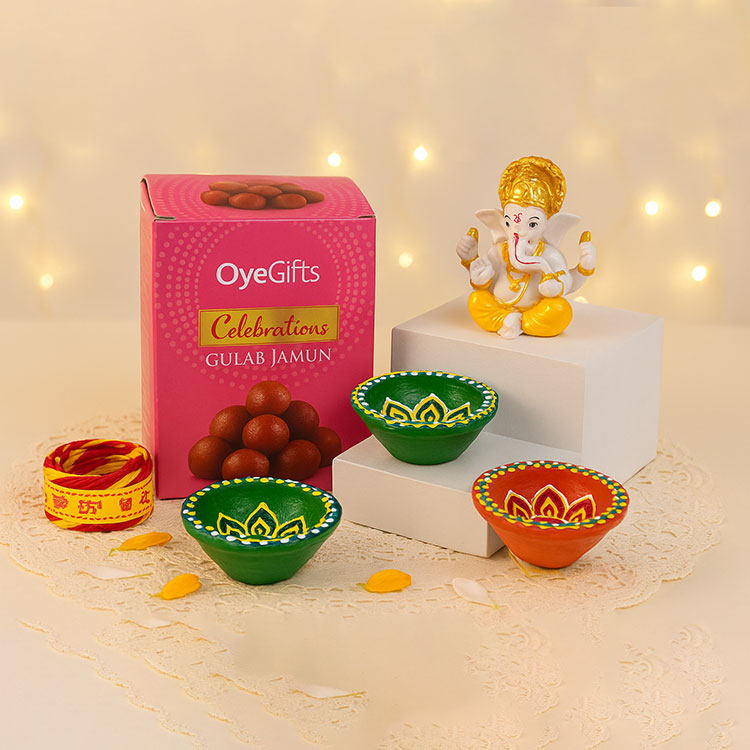 Diwali Celebration Gift Hamper with Gulab Jamun, Lord Ganesha Idol & Decorative Diyas