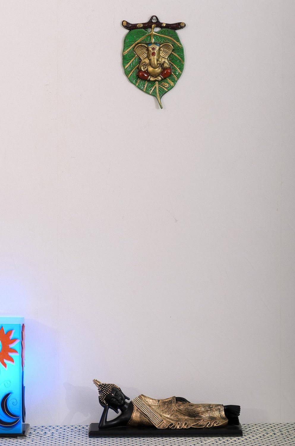 eCraftIndia Golden Metal Lord Ganesha in Red Dhoti on Green Leaf Wall Hanging Decorative showpiece for Home Decor, Wall Decor, Pooja Room Temple & Housewarming, Festival Gift - YuvaFlowers