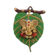 eCraftIndia Golden Metal Lord Ganesha in Red Dhoti on Green Leaf Wall Hanging Decorative showpiece for Home Decor, Wall Decor, Pooja Room Temple & Housewarming, Festival Gift - YuvaFlowers