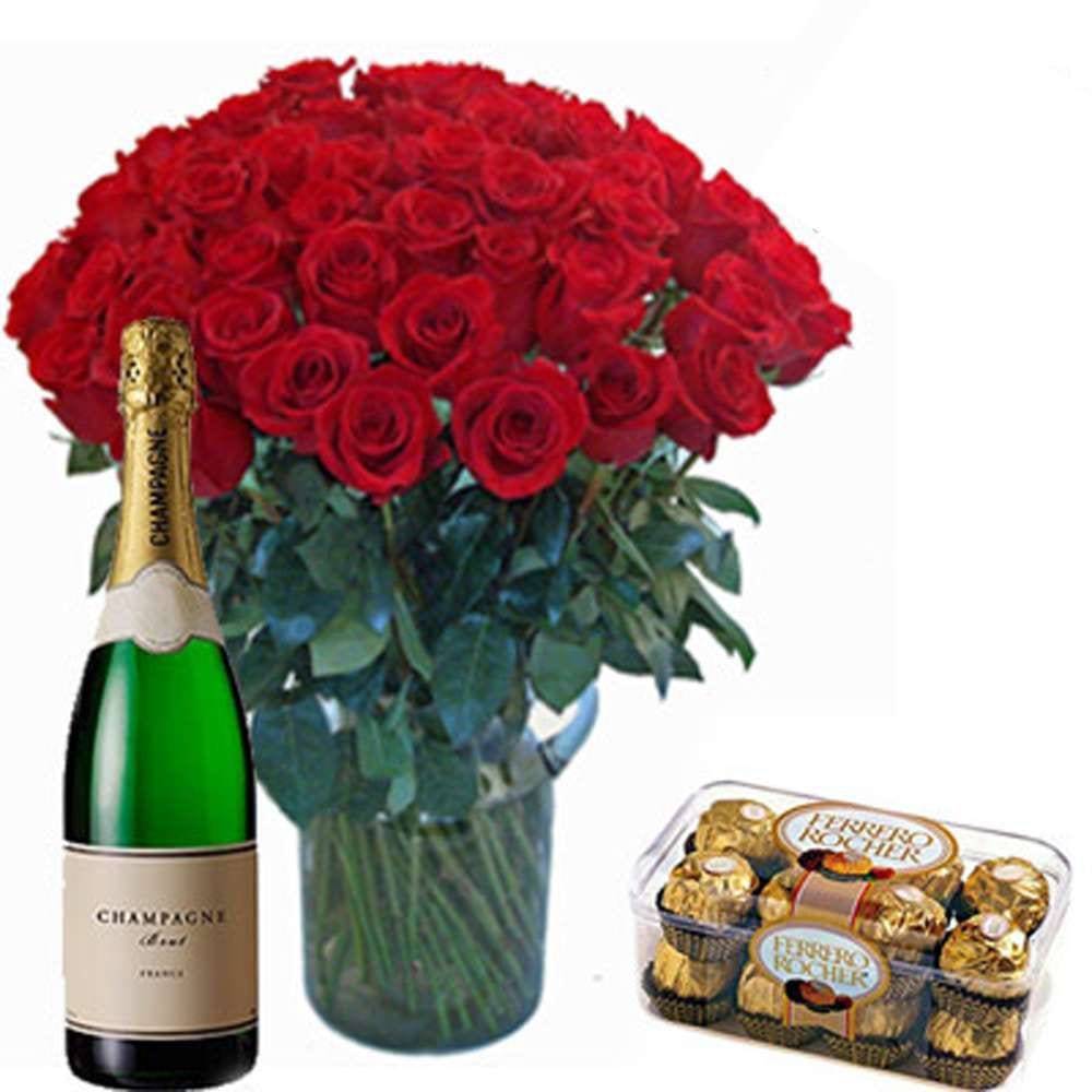 FIFTY RED ROSES VASE WITH FERRERO ROCHER CHOCOLATE AND CHAMPAGNE BOTTLE - YuvaFlowers