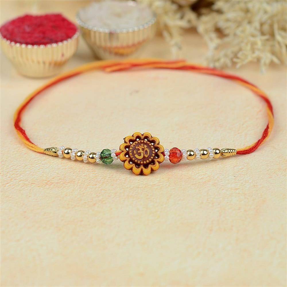 Floral Om 399 Rakhi Mauli Dori - YuvaFlowers