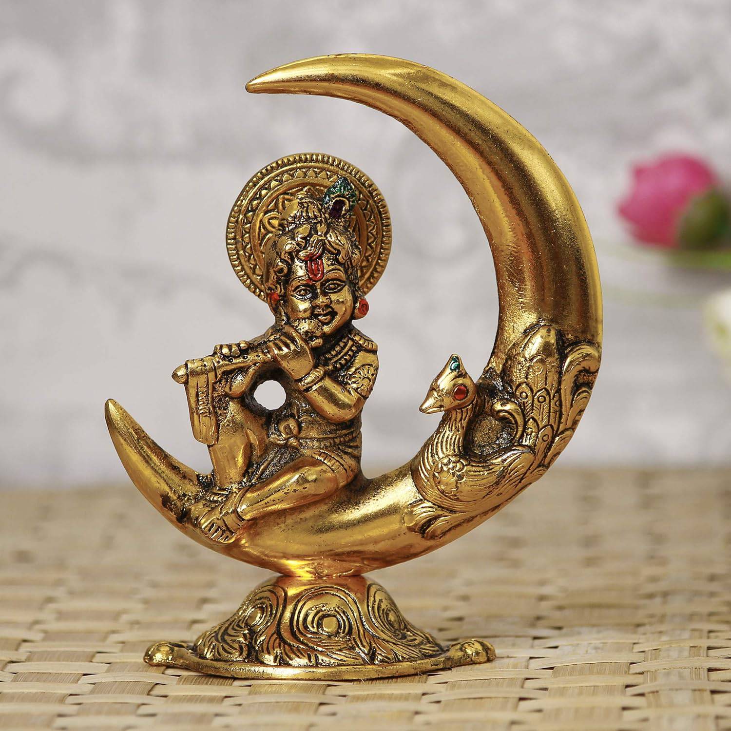 Golden Metal Handcrafted Lord Krishna Idol Playing Flute and Sitting On Half Moon Decorative Showpiece for Home Decor - Ideal Gift for Krishna Janmashtami, Housewarming, Wedding - YuvaFlowers