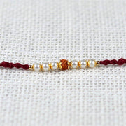 Mini Rudraksh Pearl Rakhi - YuvaFlowers