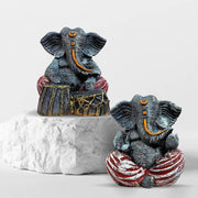 Musical Ganesha Pair for Home Decor | Brings Prosperity - (Orange and White, Pack of 2)(Resin) - YuvaFlowers