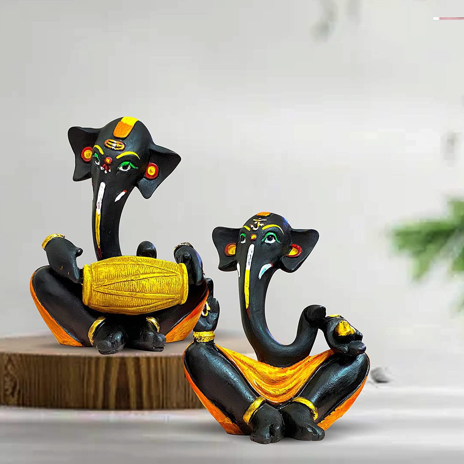 Musical Ganesha Pair for Home Decor | Brings Prosperity - (Orange and White, Pack of 2)(Resin) - YuvaFlowers