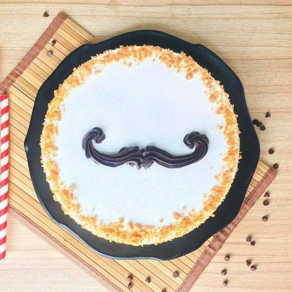 Mustache Shape butterscotch  Cake - YuvaFlowers