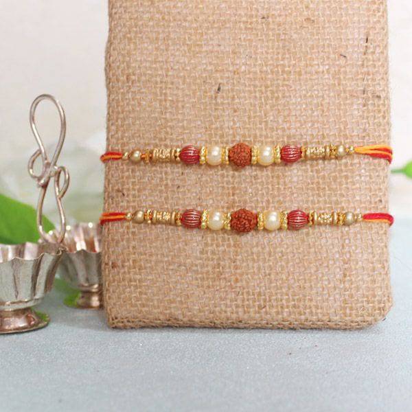 Pearl Rudraksha Rakhis - YuvaFlowers