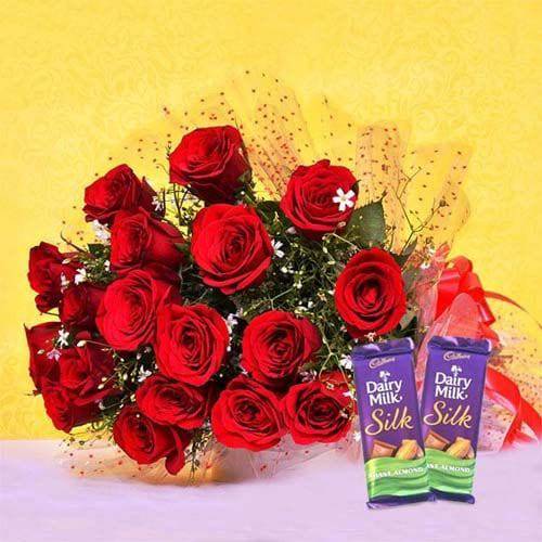 Red Blooms With Chocolaty Treats - YuvaFlowers