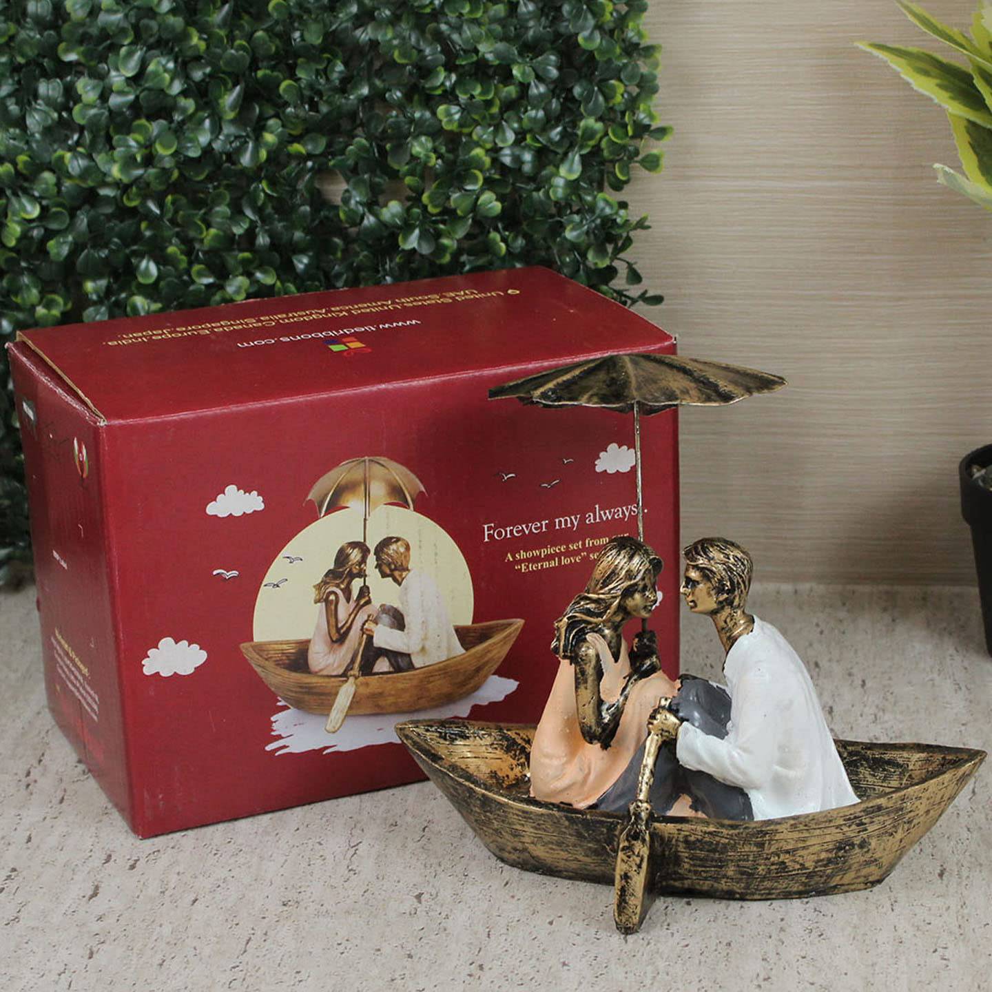 TIED RIBBONS Resin Romantic Boat Couple Showpiece Statue For Home Decor Living Room Bedroom Decoration Items Gift To Wife Husband Boyfriend Girlfriend, Multi Colour - YuvaFlowers